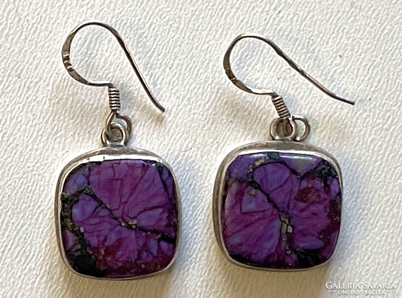A pair of silver earrings with mineral decoration
