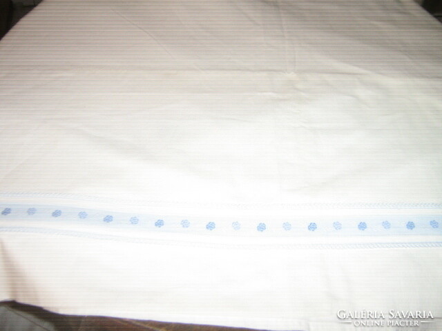 Beautiful antique white high quality woven sheet decorated with blue ribbon