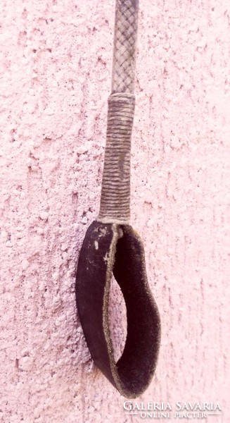 Leather braided riding whip in patina condition