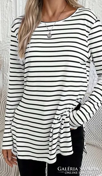 New long-sleeved women's top with stripes on both sides. Size M-L.