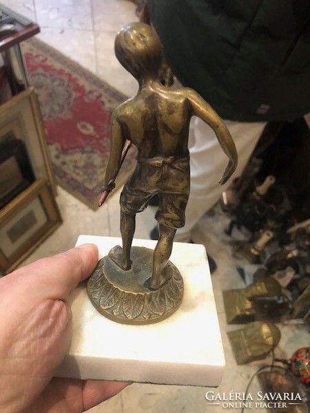 Boy playing pentaquet, bronze statue, height 15 cm.