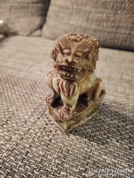 Carved pumice stone lion