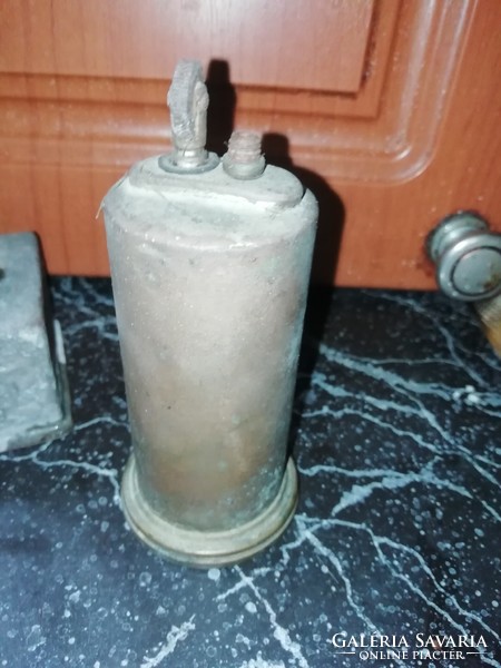 Antique table lighter is in the condition shown in the pictures