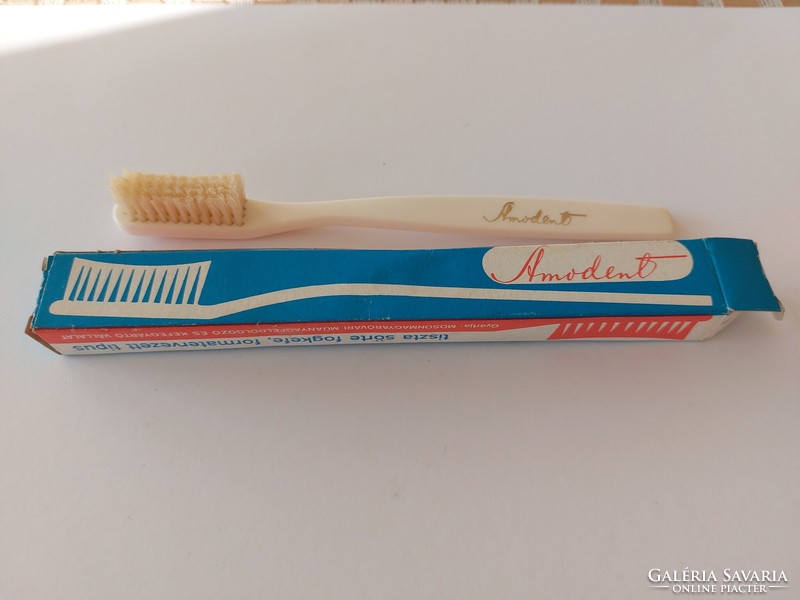 Retro amondent advertising item in an old toothbrush box