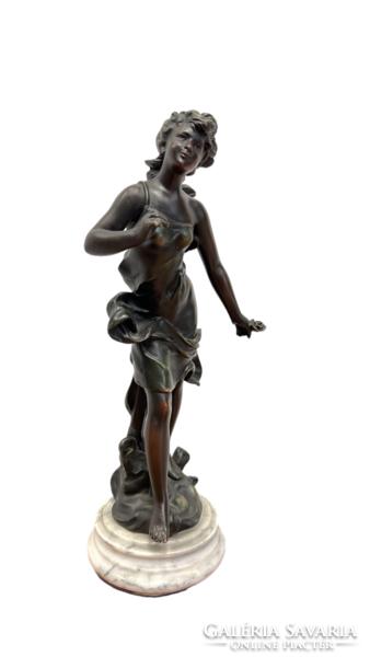 Female statue on a pedestal