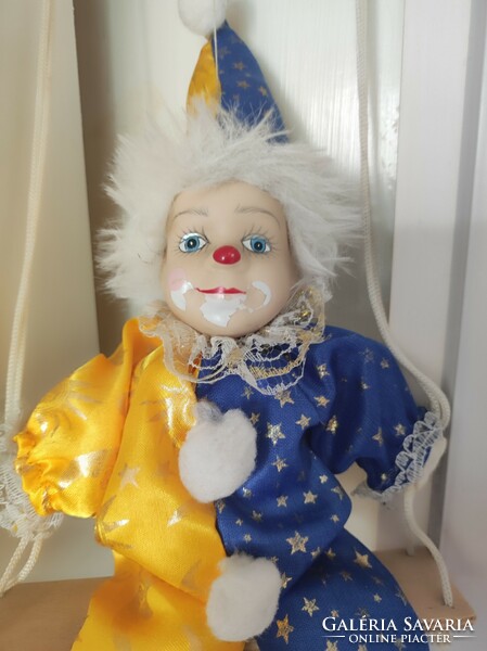 Rocking porcelain clown 50cm