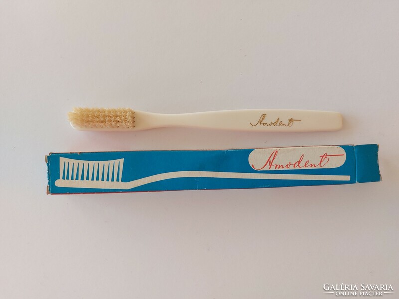 Retro amondent advertising item in an old toothbrush box