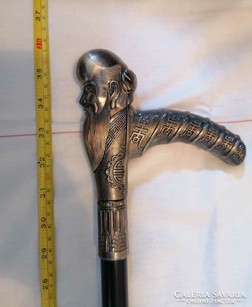 Dagger walking stick with metal head pliers