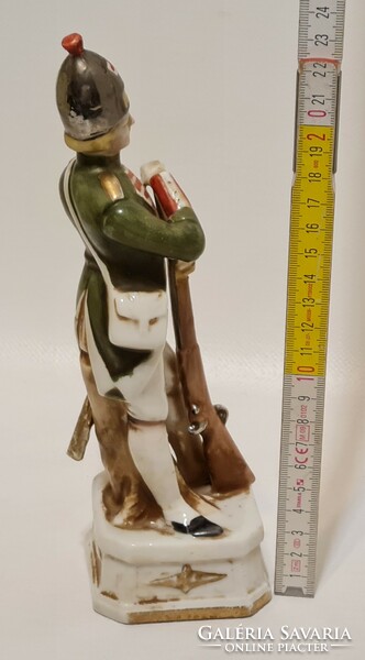 Porcelain figure of a soldier leaning on a German weapon (2906)
