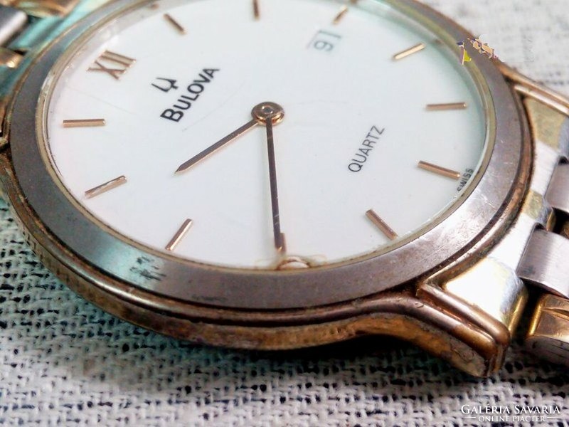 Bulova quartz, classic women's wristwatch with calendar, gold-plated band buckle, in good condition