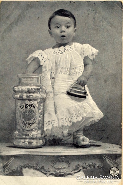 Antique photo postcard - little child power with glass bonbons. Italian Loretti advertisement sheet from 1905