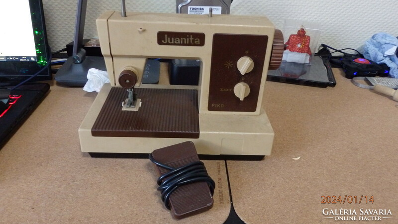 Toy sewing machine made by Piko