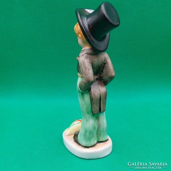 Industrial ceramic boy figure with a cylinder