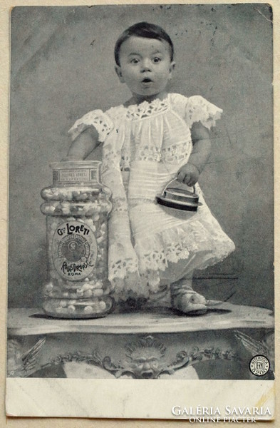 Antique photo postcard - little child power with glass bonbons. Italian Loretti advertisement sheet from 1905