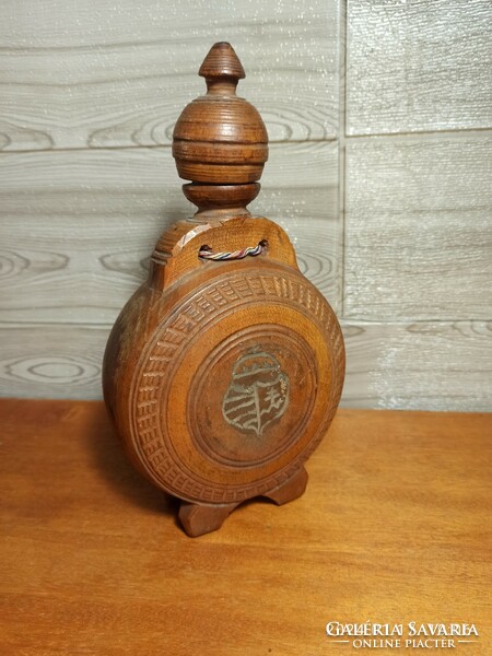 100-year-old carved coat of arms water bottle