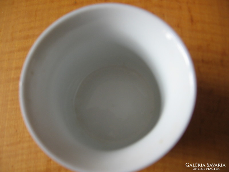 Small porcelain bowl with blue legs