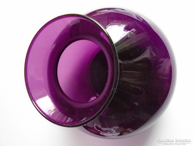 Purple-burgundy blown, broken vase. Its height is 18 cm.