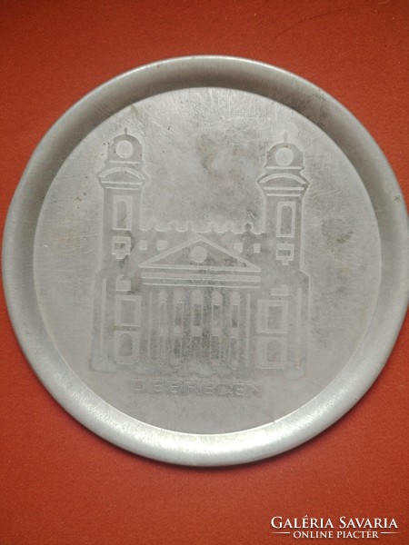 Retro aluminum plate depicting a great church