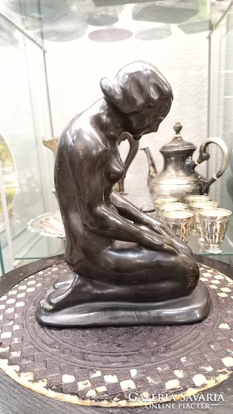 Antique nude ceramic statue