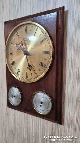 Weimar quartz East German wall clock with barometer and hygrometer.
