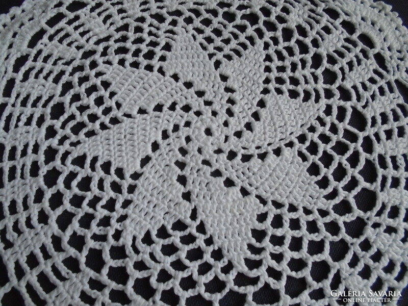 25 cm diam. Tablecloth crocheted from snow-white soft cotton yarn.