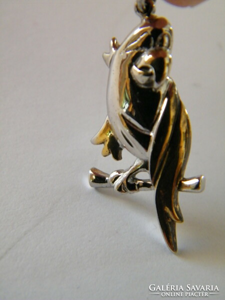 Gold-plated silver pendant in the shape of a parrot
