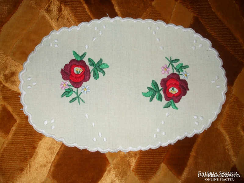 Small oval matyó pattern needlework tablecloth on sun fabric, hemmed around, unused, length: 25 Cm,