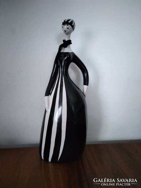Art deco female figure in black and white dress from Bodrogkeresztúr (damaged, repaired)