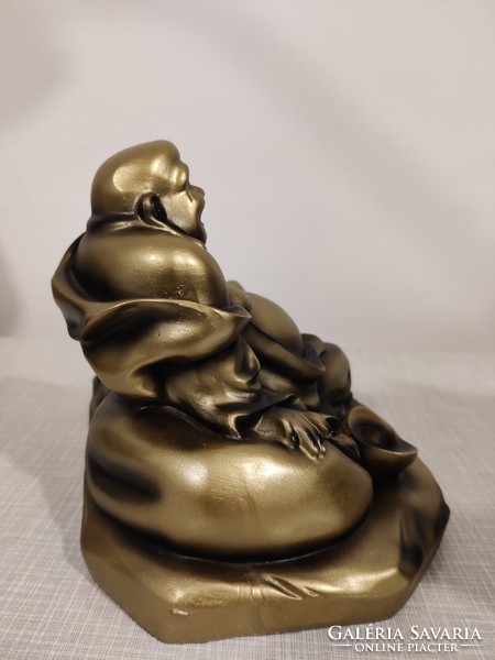 Lucky pot-bellied Buddha statue made of resin