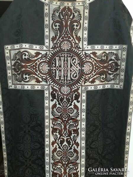 Black brocade vestment with silver trim