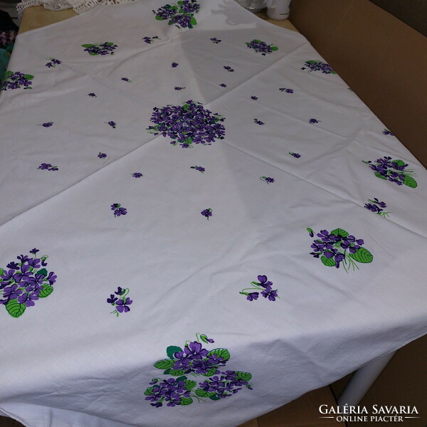 Old, magny-sized tablecloth with a violet pattern