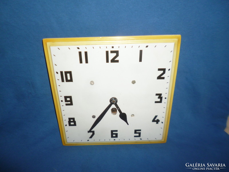 Old wind-up porcelain wall clock