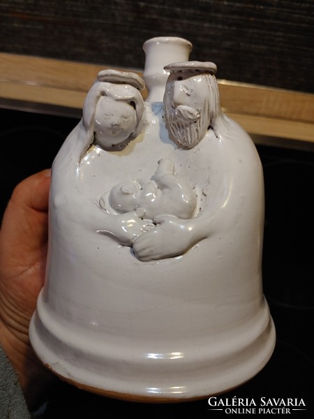 Ceramic candle holder of a married couple with their child
