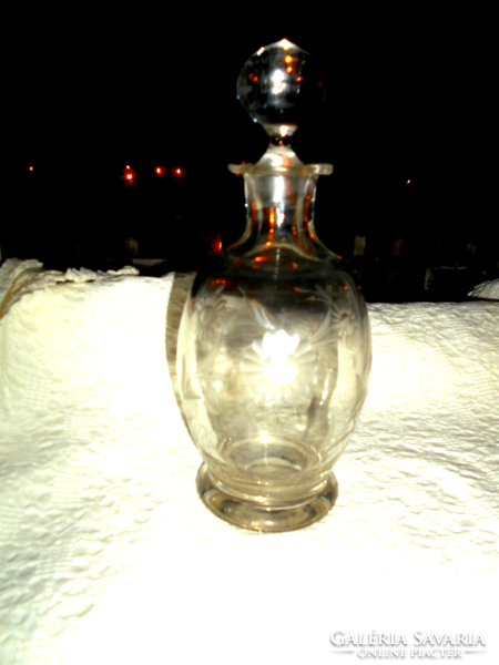 Antique polished heavy glass bottle with original stopper