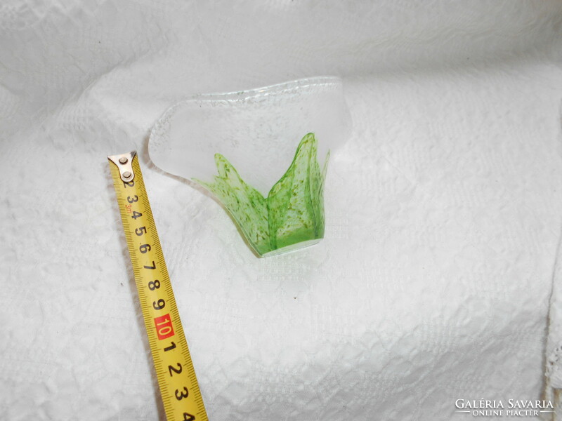 A special flower figure made of glass in a handcrafted small frame glass studio