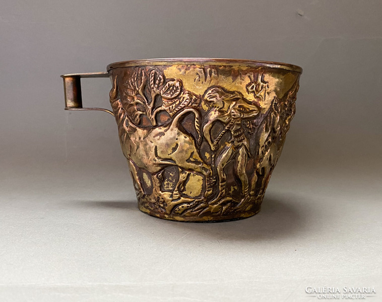 Replica of an ancient Greek gold cup.