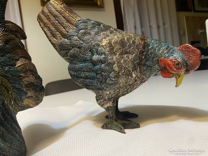 Bronze rooster and hen