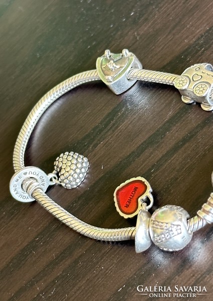 Silver pandora bracelet with several charms 2