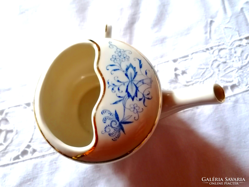 Old, onion-patterned porcelain nursing cup