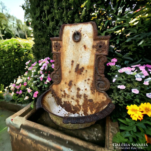 Retro, vintage, rustic cast iron wall fountain