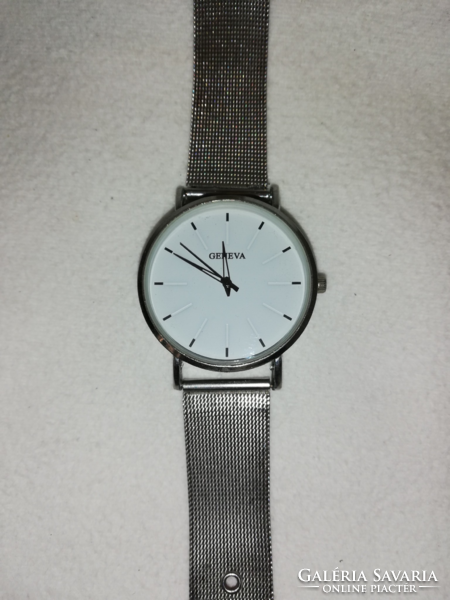 Geneva wristwatch with metal strap