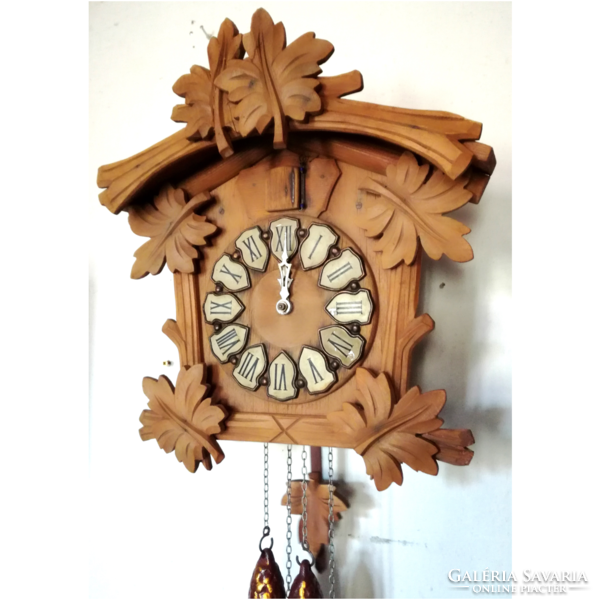 A classic beautifully carved cuckoo clock