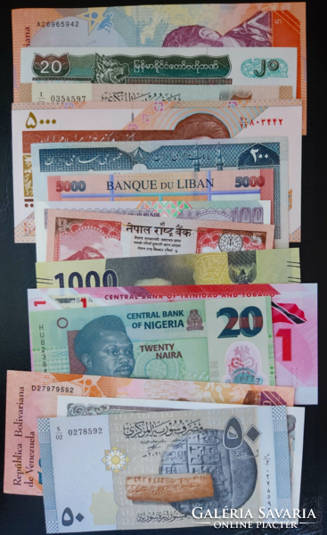 100 unc mixed unfolded banknotes.