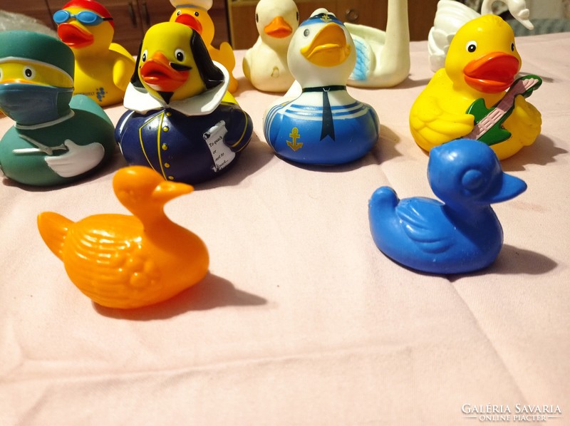 A collection of 14 rubber and old plastic ducks!!!