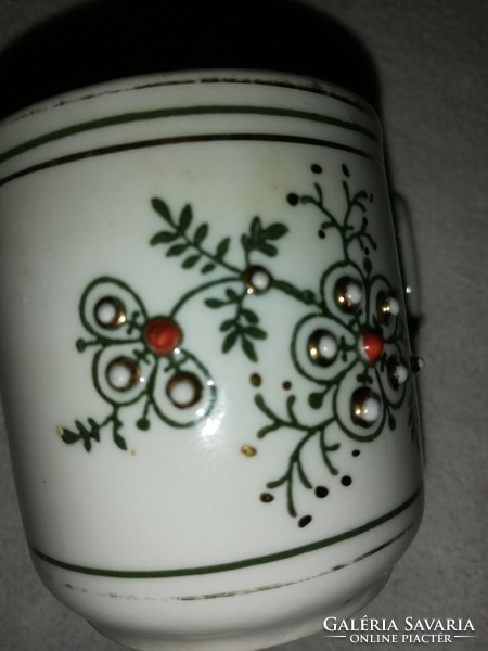 Vintage coffee cup with a plastic embossed pattern