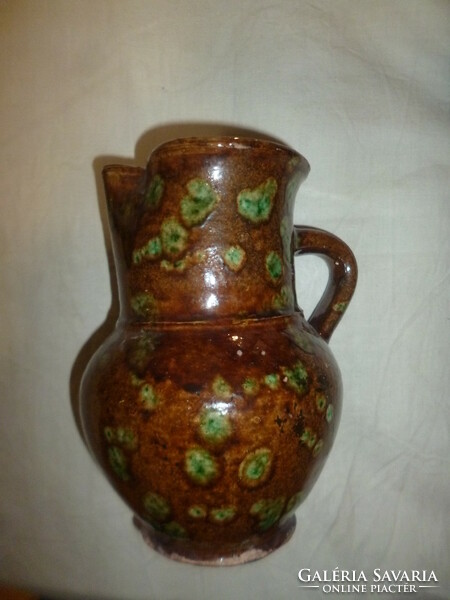 Antique folk glazed earthenware jug