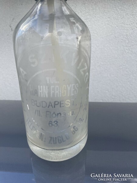 Flóra salt water factory, labeled soda bottle