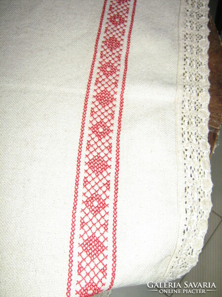 Beautiful antique hand-embroidered cross-stitch woven tablecloth with lacy edges