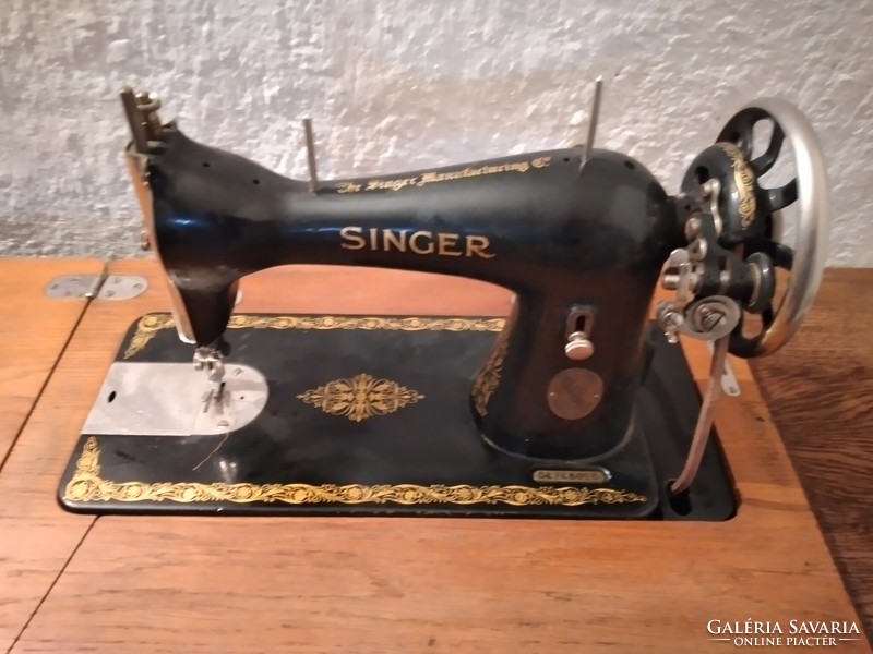 Old singer sewing machine with stand for sale, sealed