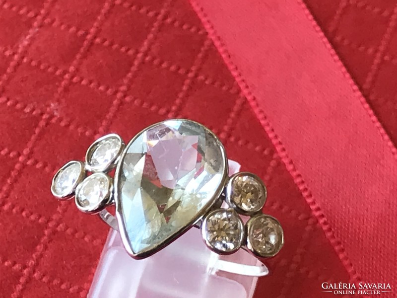 White gold ring with aquamarine and six large moissanite diamonds
